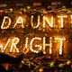 A display of candles and flowers spells the name of Daunte Wright at a protest over his death on April 12, 2021, in Seattle, Washington. Wright, a Black man whose car was stopped in Brooklyn Center, Minnesota on Sunday reportedly for expired registration, and not far from where George Floyd was killed during an arrest in Minneapolis last May, was shot and killed by an officer who police say mistook her service revolver for a Taser.